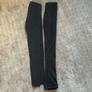 2 pairs of black Chloe Noel figure skating leggings